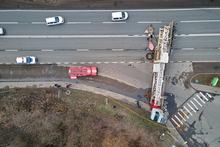 aerial-view-road-accident-with-overturned-truck-blocking-traffic