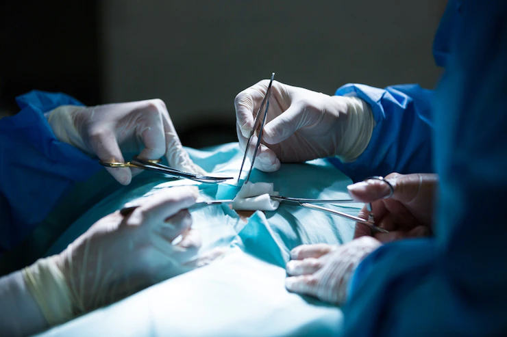 surgeons-performing-operation-operation-room