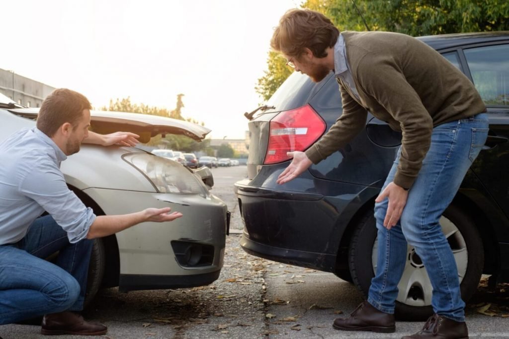 Two,Men,Arguing,After,A,Car,Accident,On,The,Road