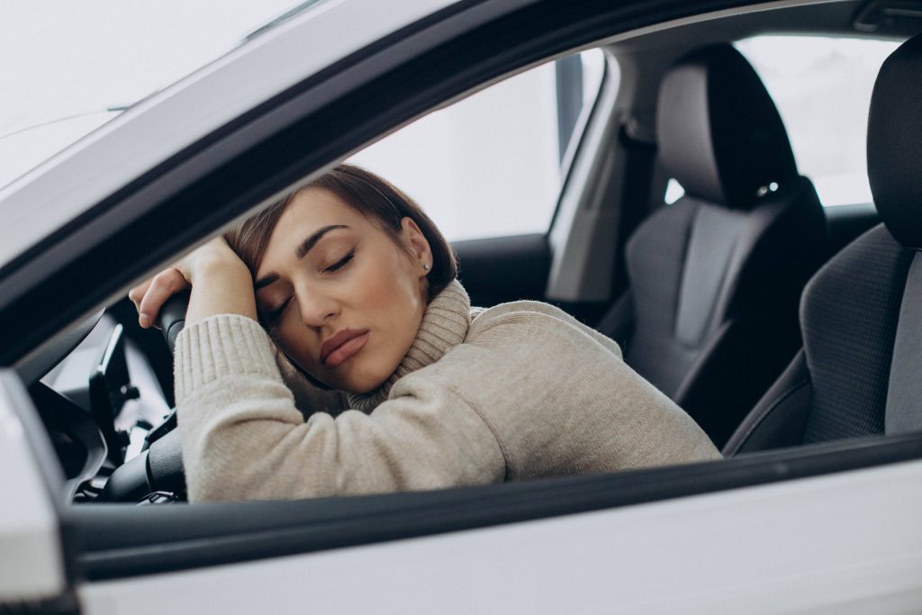 the woman fell asleep while driving car