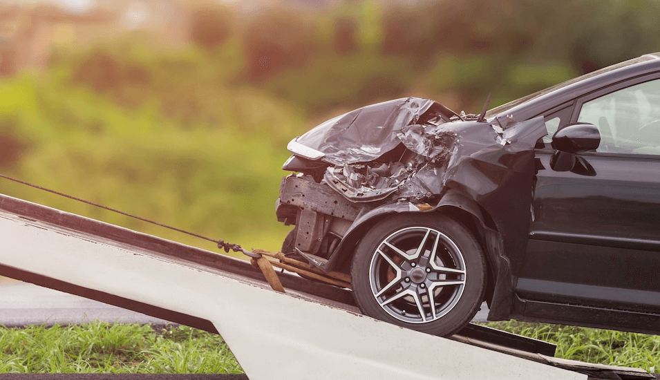 Car on towing truck after car accident