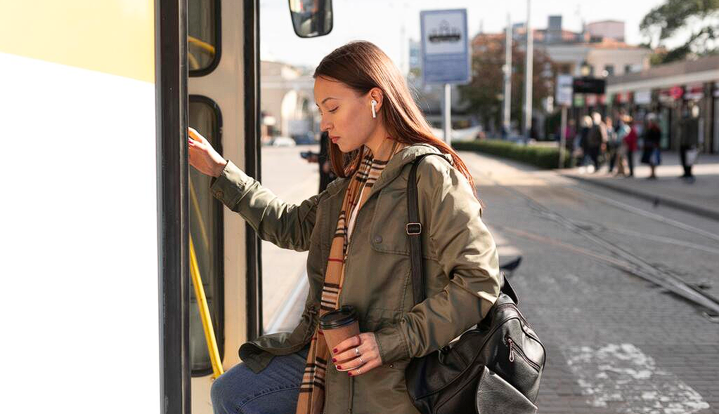 woman boarding the bus